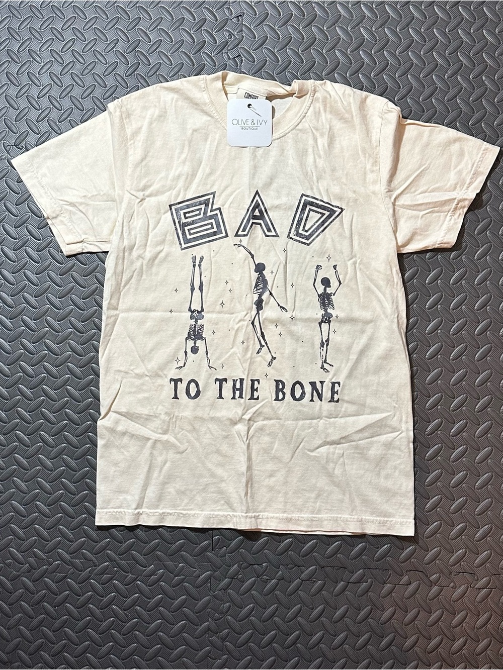 NWT Woman’s Cream Graphic Tee - "Bad To The Bone"